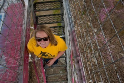 Michelle climbing the Woodstock Fire Tower on top of Massanutten Mountain in the George Washington NF