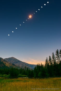 The Great American Total Solar Eclipse over the Sawtooth Mountains as viewed from The Atlanta Ranger Station in the Boise National Forest outside the town of Atlanta