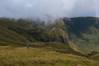 Michelle hikes around the rim of the massive volcanic caldera on the Island of Faial.